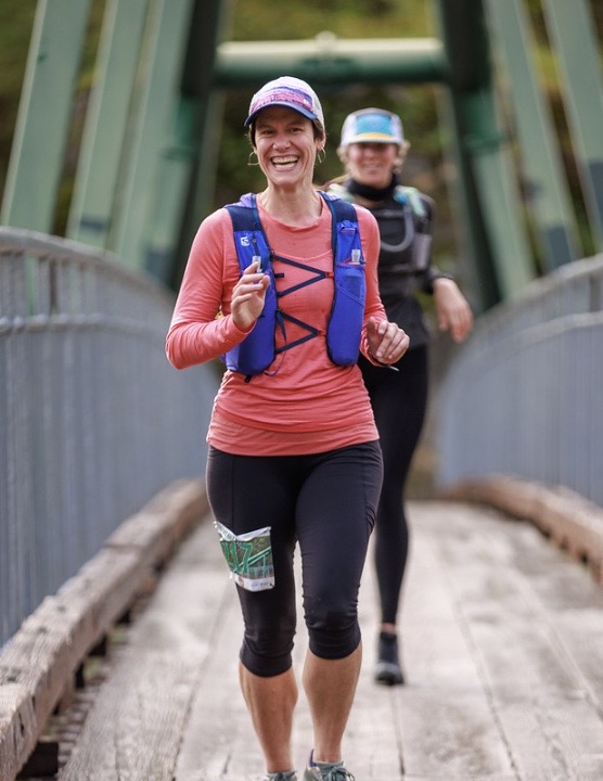 The second image is of Dr. Theobold running across a bridge in a trail race.